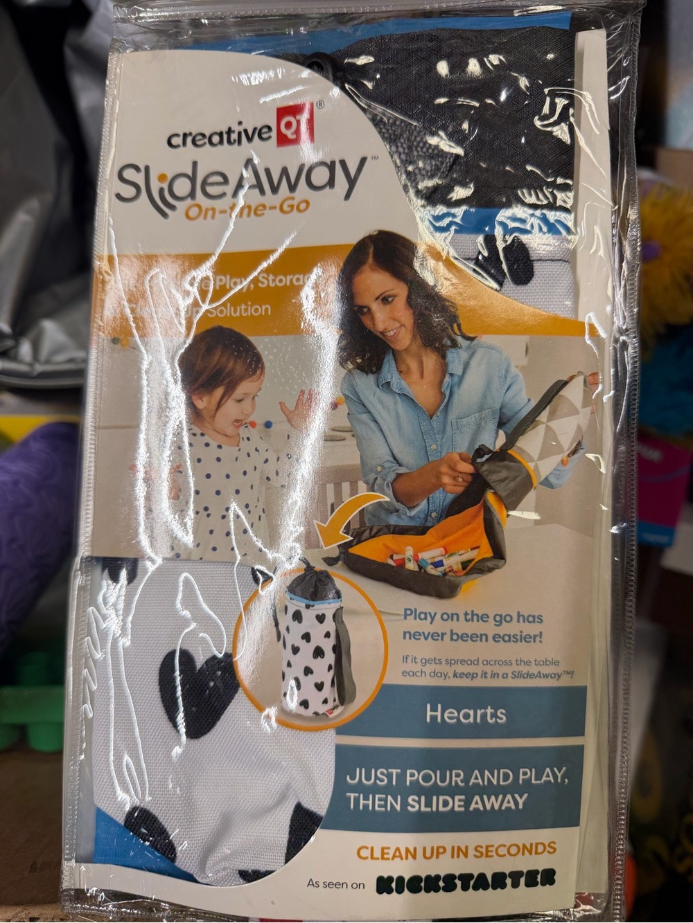 Amazon SlideAway On-the-Go Play Mat & Storage Pouch - Black, White, Blue, Orange